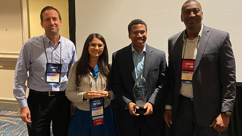 Kevin Nixon (third from left) with his trophy at the DuPont GOLD Seminar Competition.