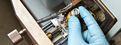 Student recalibrating a machine using his fingers