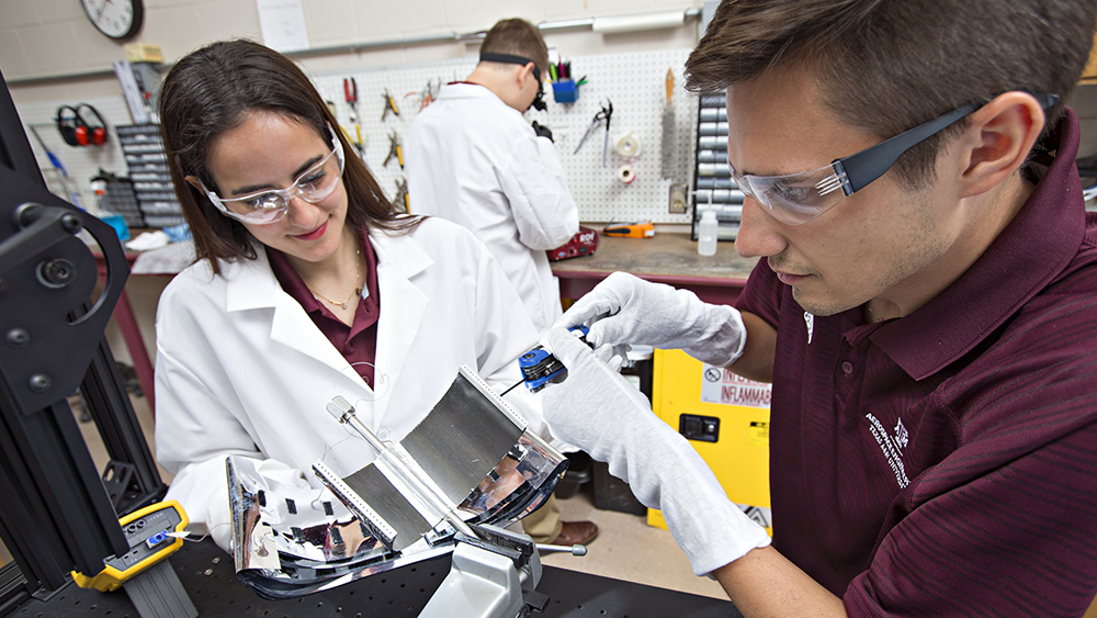 Students working in the Maestro lab