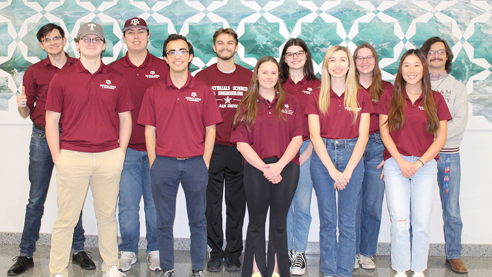 Group of students standing in two rows