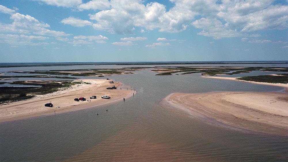 View from a drone of evidence of coastline erosion as the result of storms