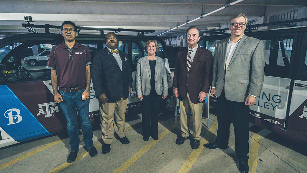 Texas A&amp;M University System and City of Bryan officials at the launch of Texas A&amp;M autonomous shuttles in downtown Bryan.