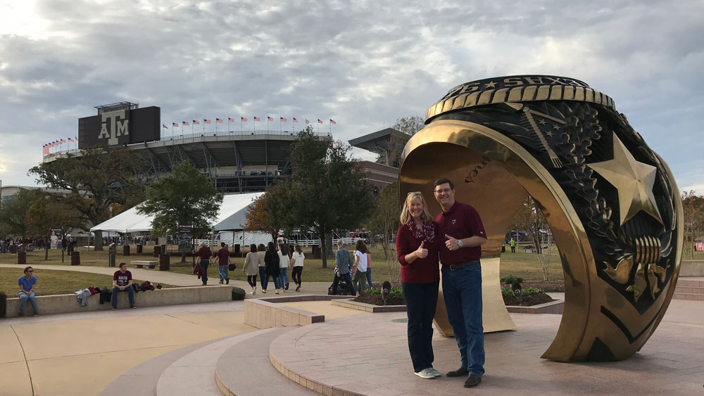 Melanie and Joe Gregory '82 at the Association of Former Students building at Texas A&M