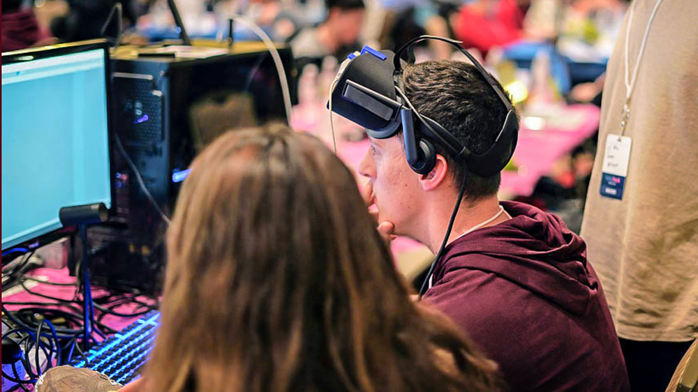 Image of students participating in TAMUhack.