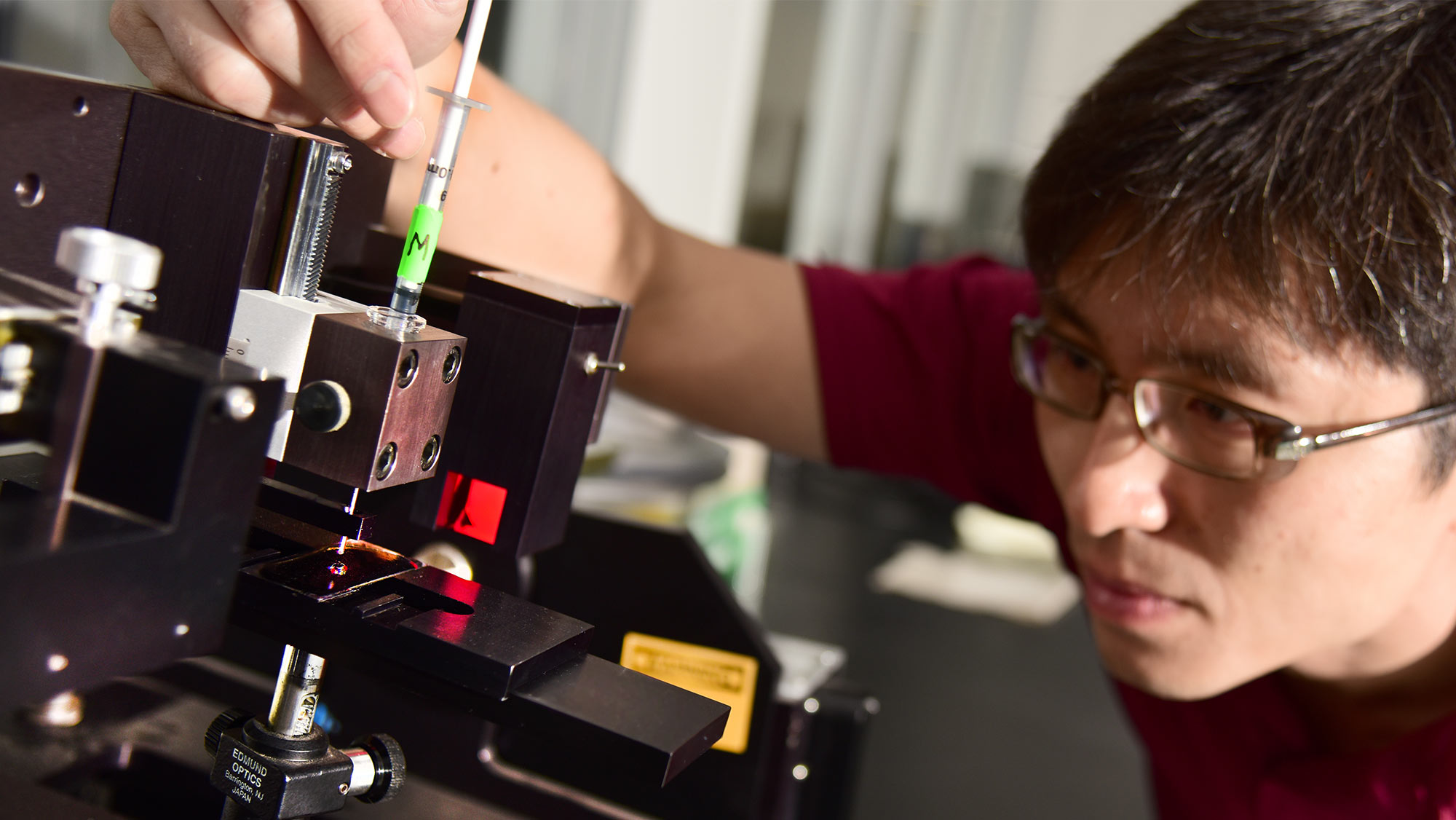 Civil Engineering student working in a lab. 