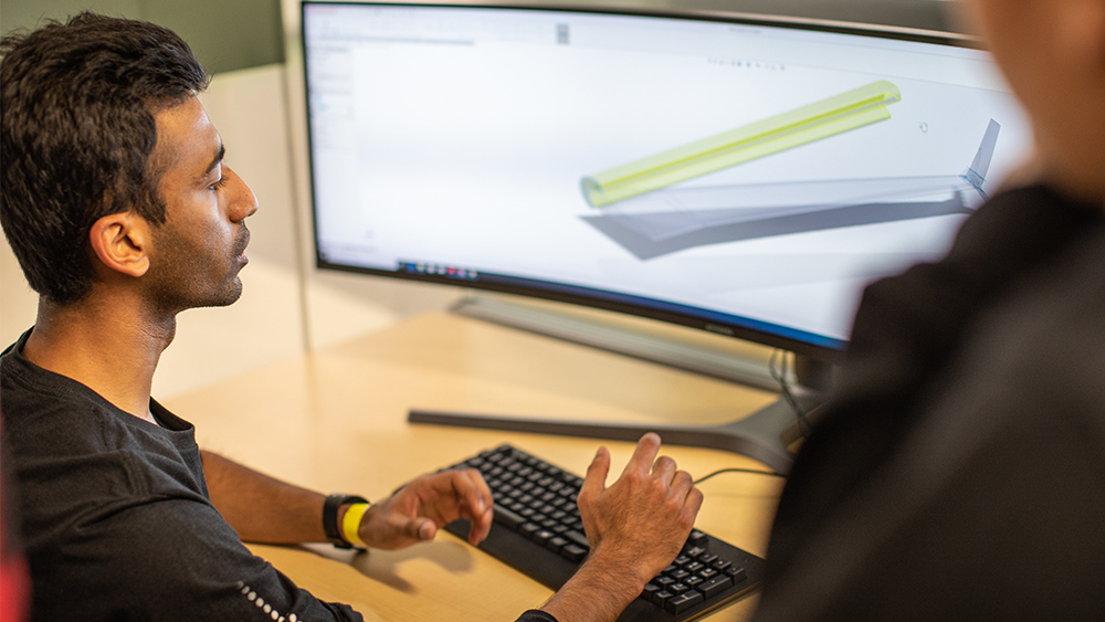 A student looking at a computer screen