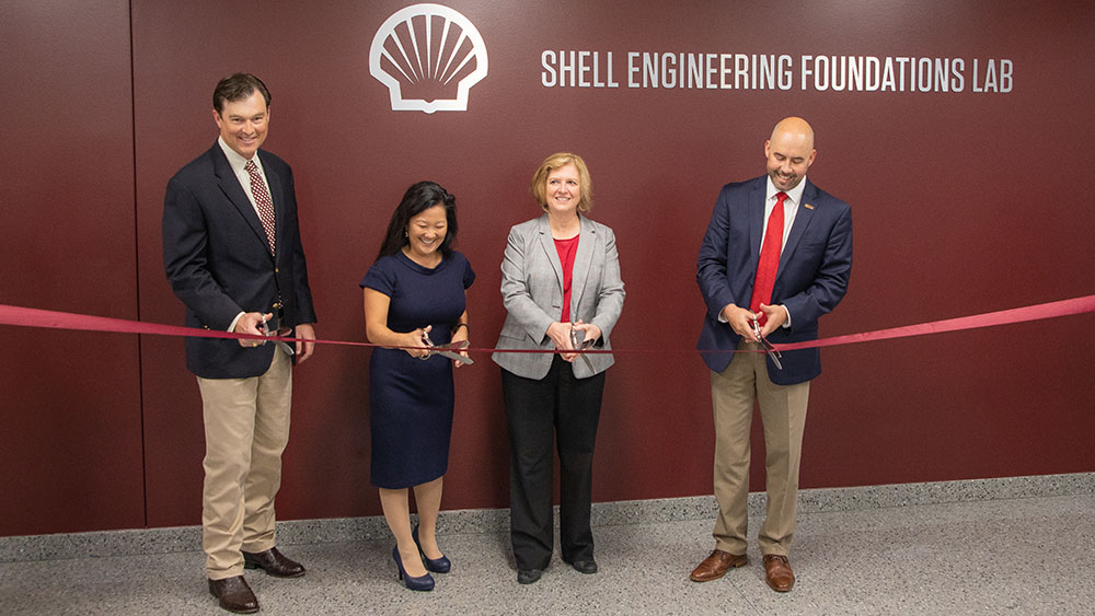 Shell donation ribbon cutting