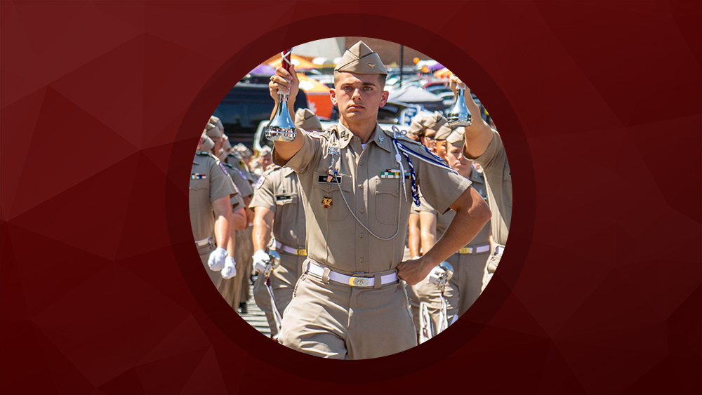 Head drum major Michael Milton leading the Fightin' Texas Aggie Band.