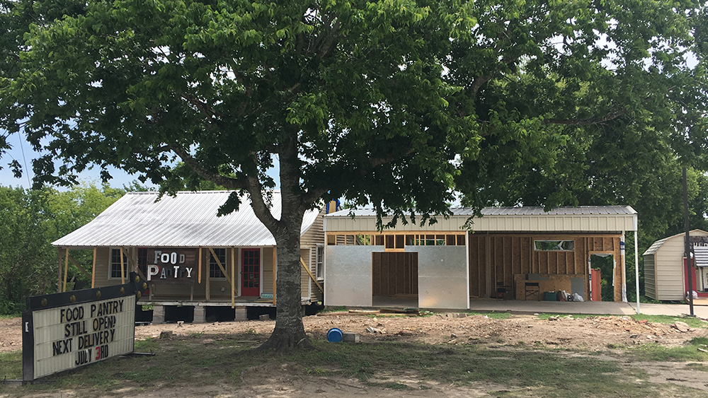 View of the front of the Anderson Food Pantry building during renovations.