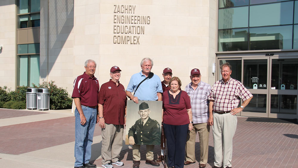 Class of '62 Squadron 13 members in front of the Zachry Engineering Education Complex. 