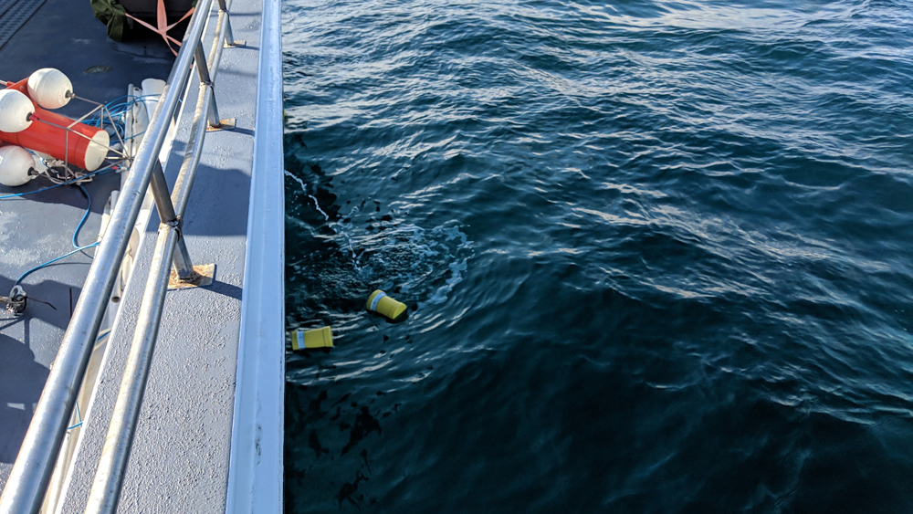 Yellow containers in the ocean