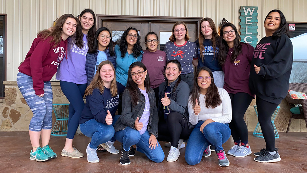 SWE organization smiling at a retreat.