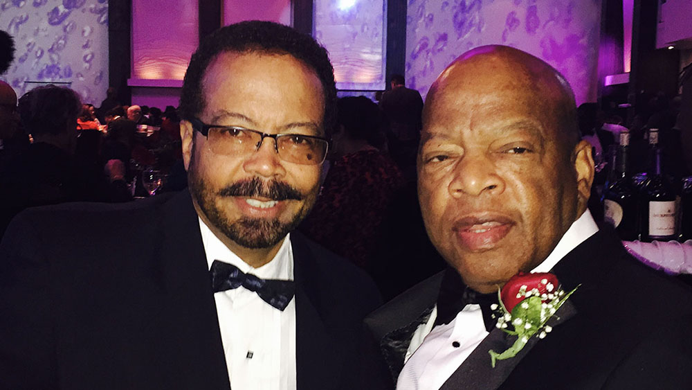 Photo of Dr. Roderic Pettigrew and the late Congressman John Lewis