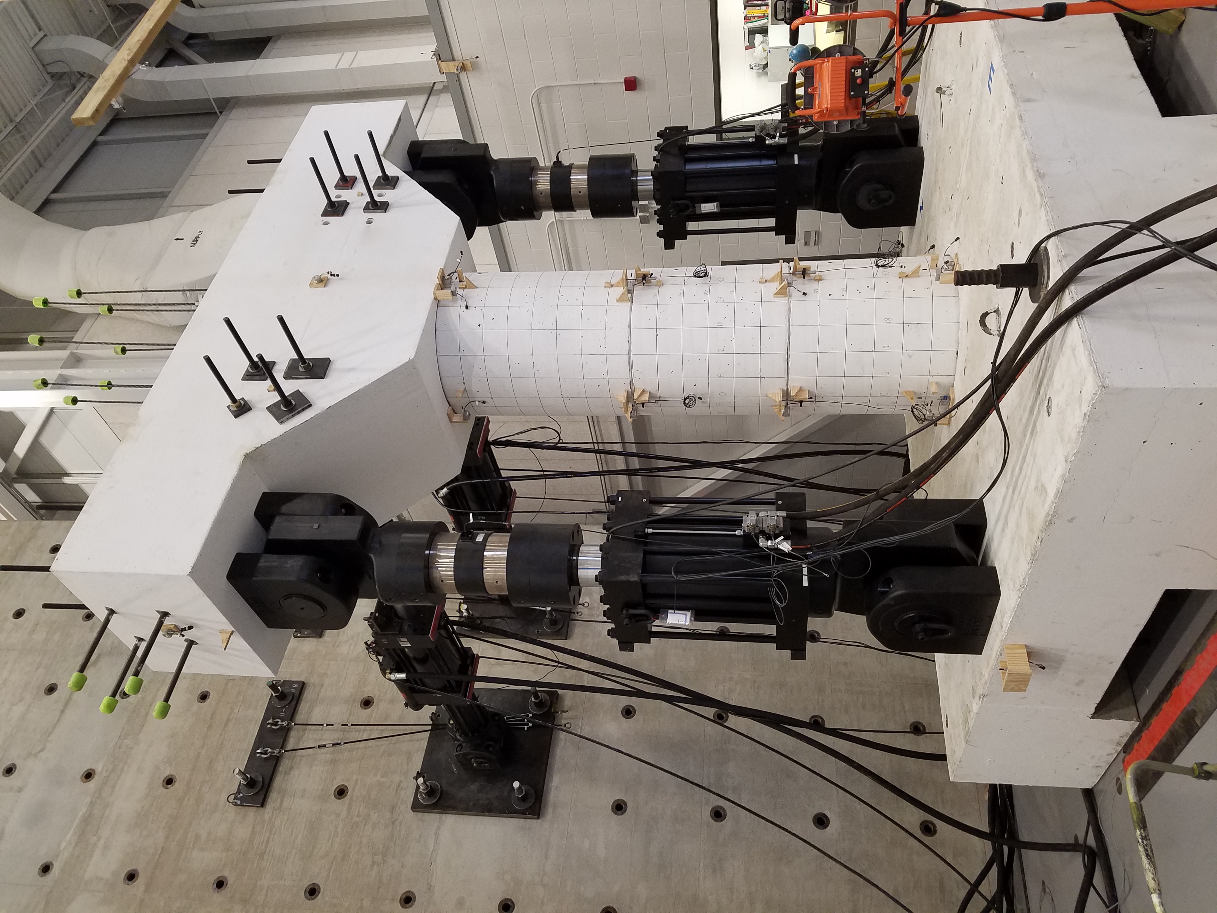 Experimental setup using a specimen of the hybrid sliding-rocking bridge.