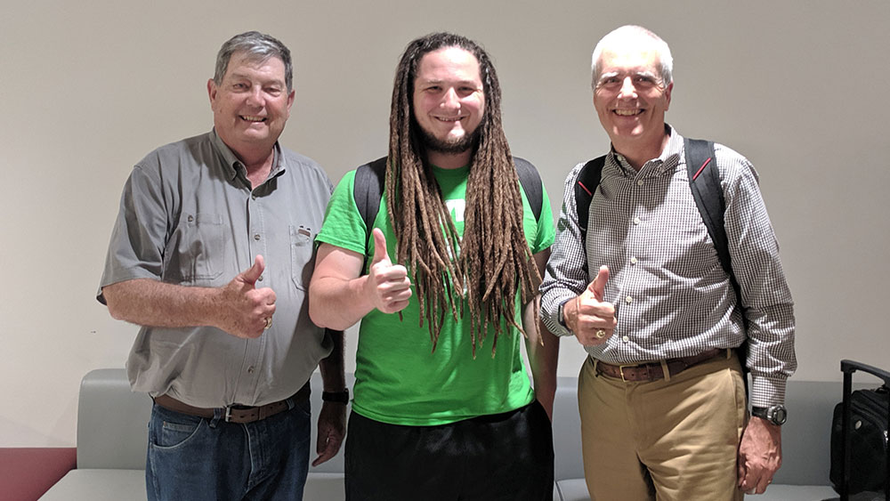 Michael Bass (middle) with Rodney Boehm, engineering entrepreneurship program director (right)