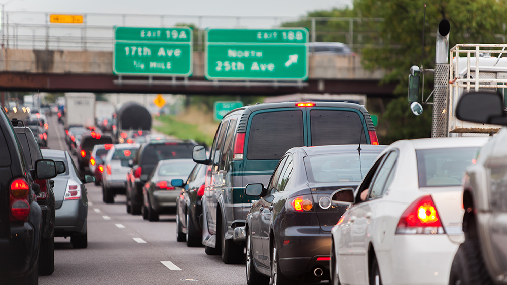 Several lines of cars and other vehicles stopped on highway