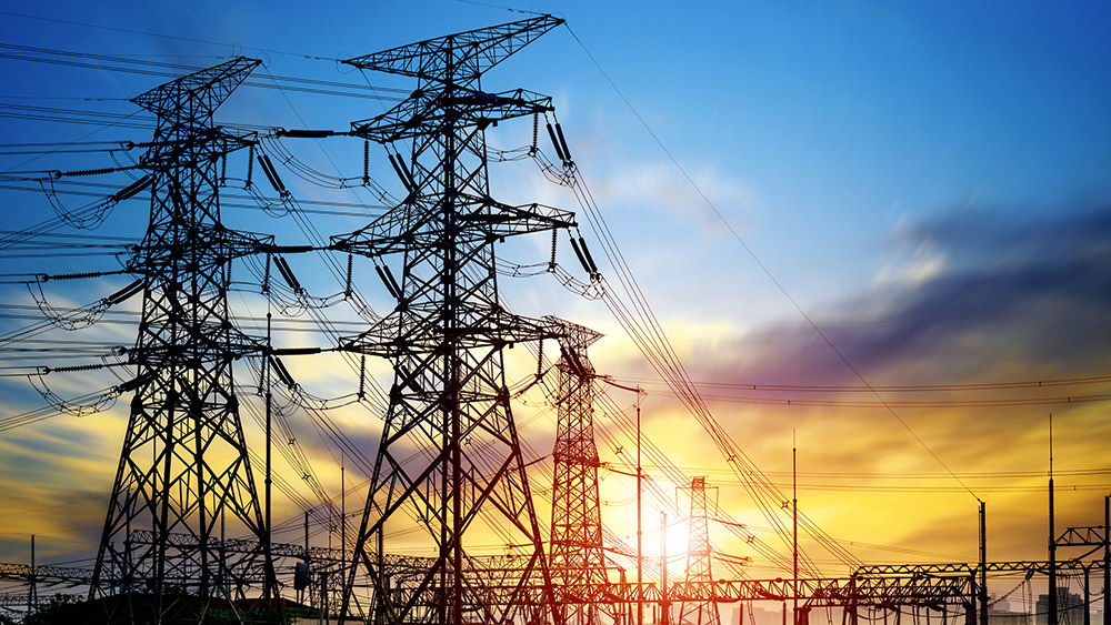 Photo of power lines at sunset.