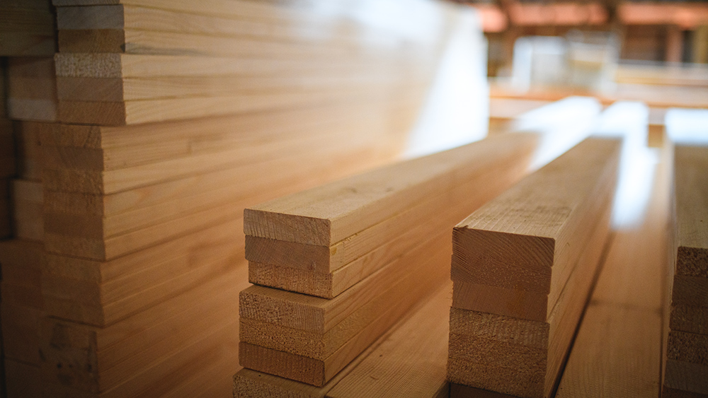 Cut lumber stacked in a pile. 