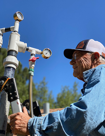 Ken Nolen working on artificial lift equipment.