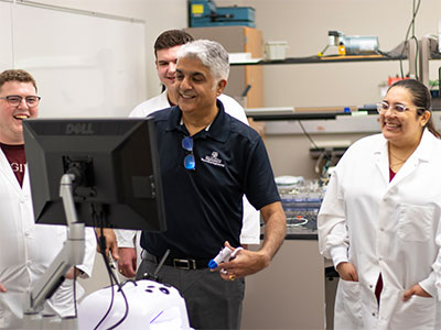 Dr. Balakrishna Haridas using a simulator to test out a pediatric device