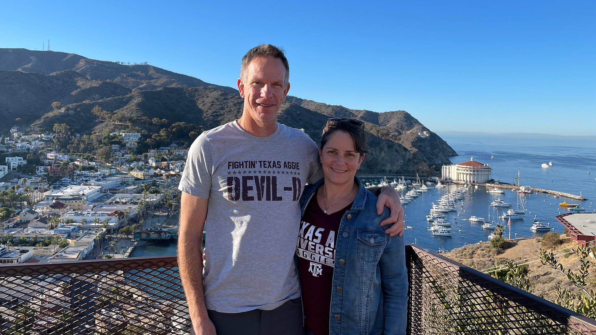 David “Alan” James ’90 and Leigh Ann James ’90 in front of a bay.