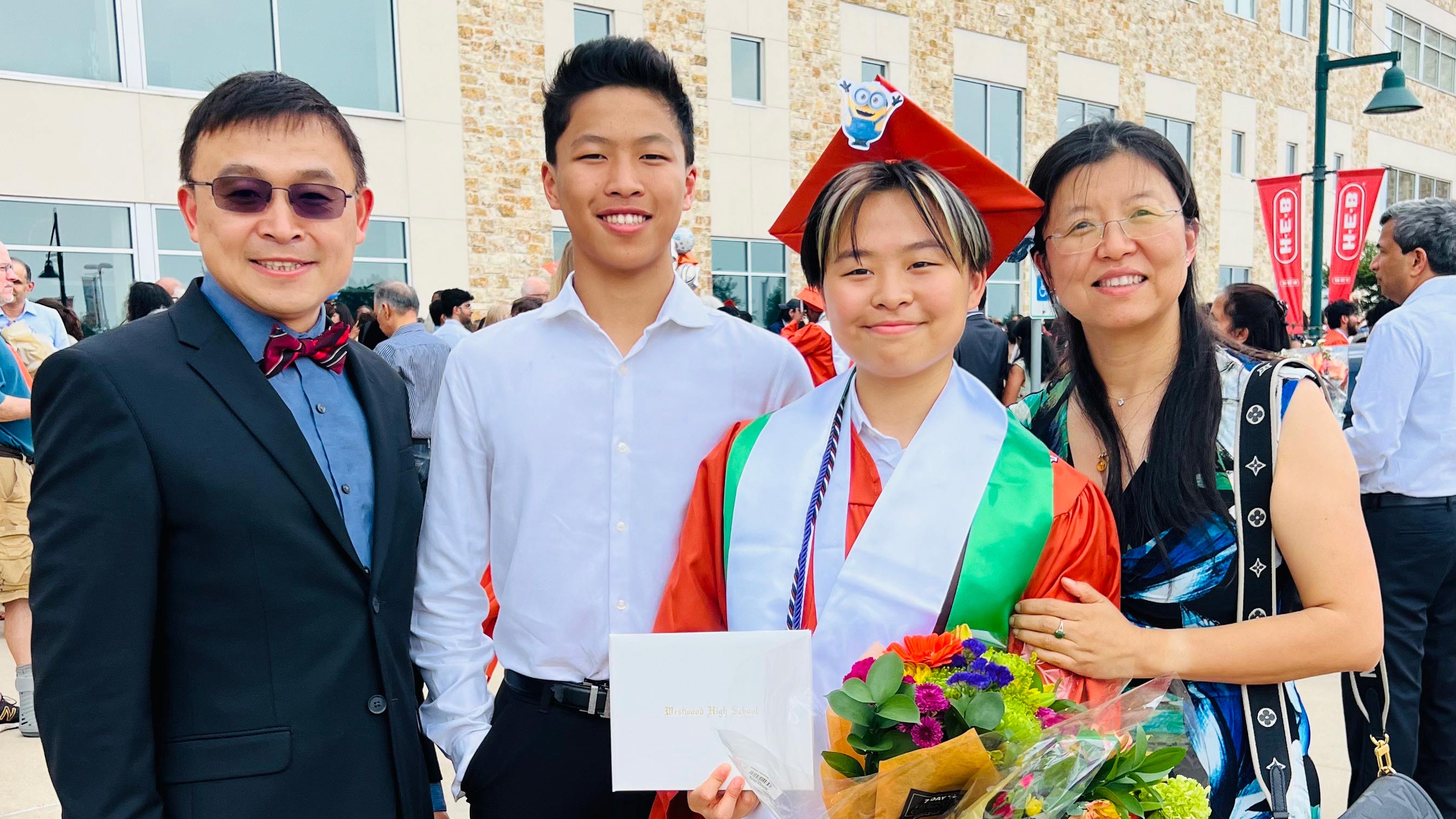 Family with graduate.