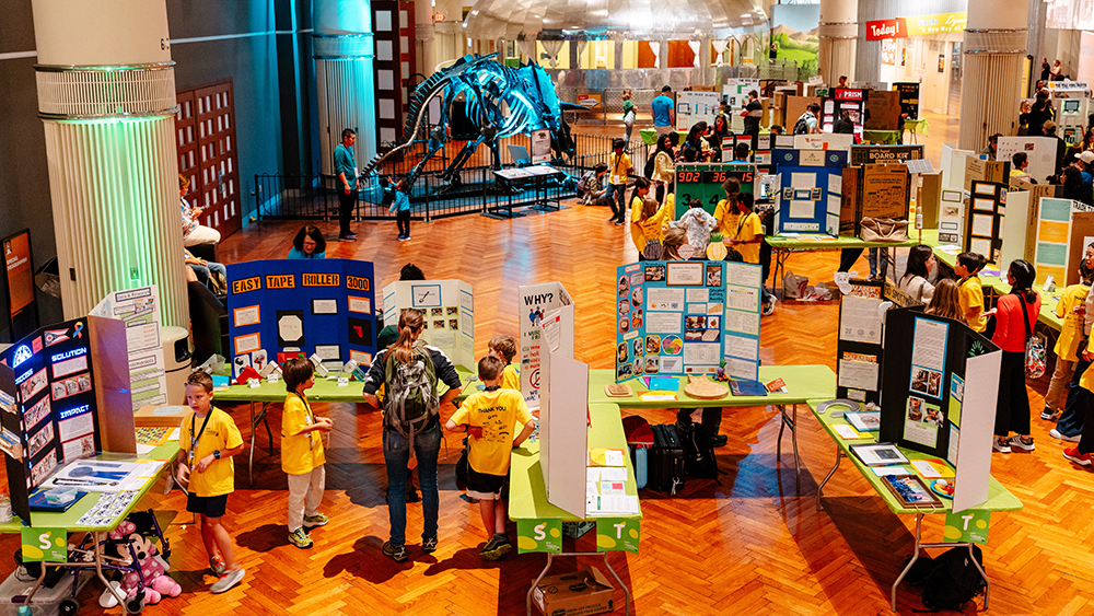 Aerial view of the Invention Convention National competition floor with students and projects. 