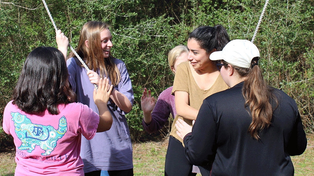 Girls having fun while at a retreat.